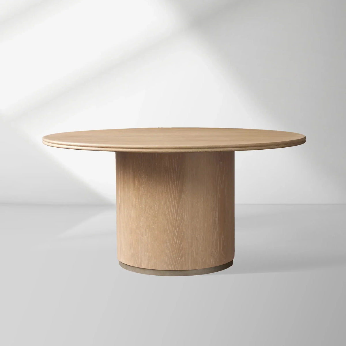 Caden Round Wood Dining Table with Sculptural Base & Antiqued Metal Plinth