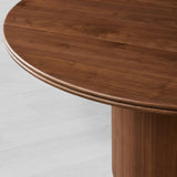 Caden Round Wood Dining Table with Sculptural Base & Antiqued Metal Plinth