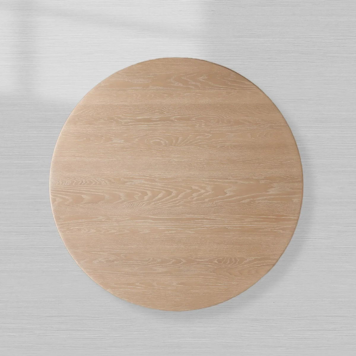 Caden Round Wood Dining Table with Sculptural Base & Antiqued Metal Plinth